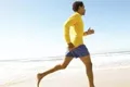 Man running on beach tn 1
