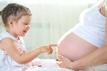 Pregnant woman and child