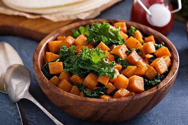 Oven roasted kale and sweet potato with creamy polenta