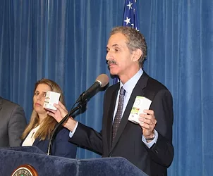 City attorney mike feuer displaying rainbow lite prenatal vitamins. august 14 2019 min