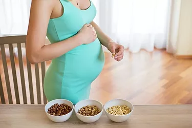Pregnant woman nuts fatty foods