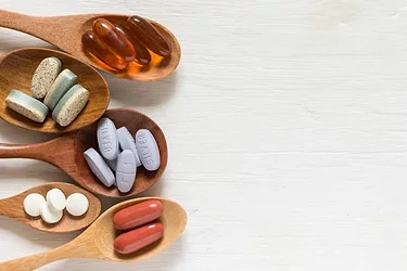 Dietary supplement vitamins 696x464
