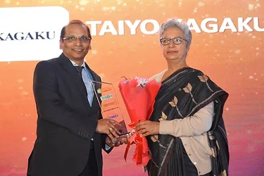 T.p. rao ph.d. managing director of taiyo kagaku india accepting functional food ingredient company of year award dec2019 close up