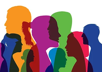 Concept of a cosmopolitan population with different silhouettes of men's and women's heads in colors and profile views.