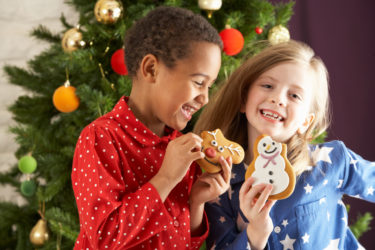Happy Kids enjoying Holiday Cookies