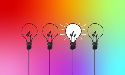 Set of light bulbs with a glow on colorful background. Modern vector icons of light bulbs. Concept of equality in companies and business.