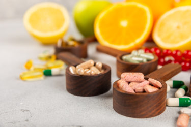 Assorted Nutritional Supplements and Fresh Fruits - GettyImages-1874963388.jpg
