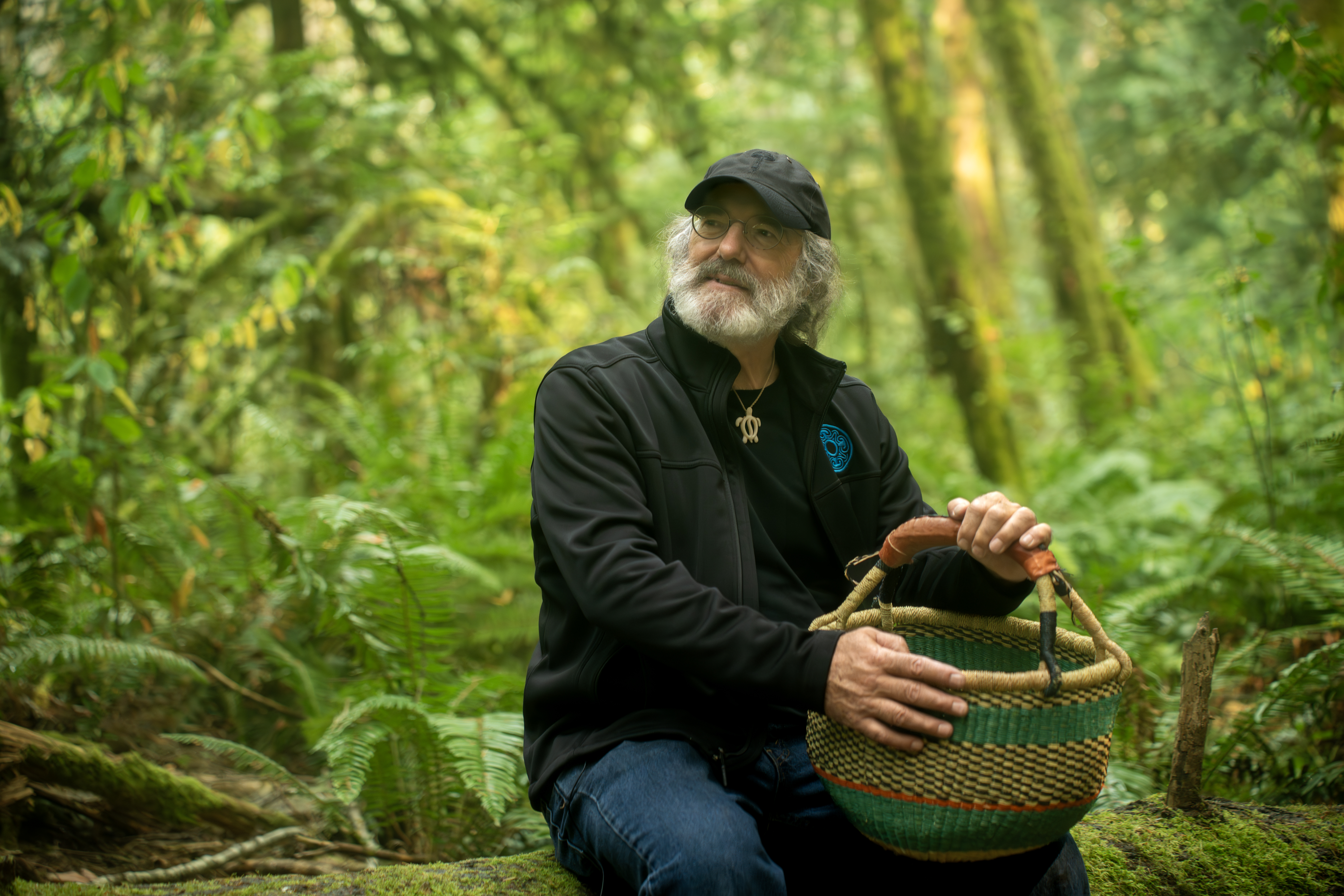 Paul Sitting on Log Basket Evergreen Forest 08-23-2023.jpg