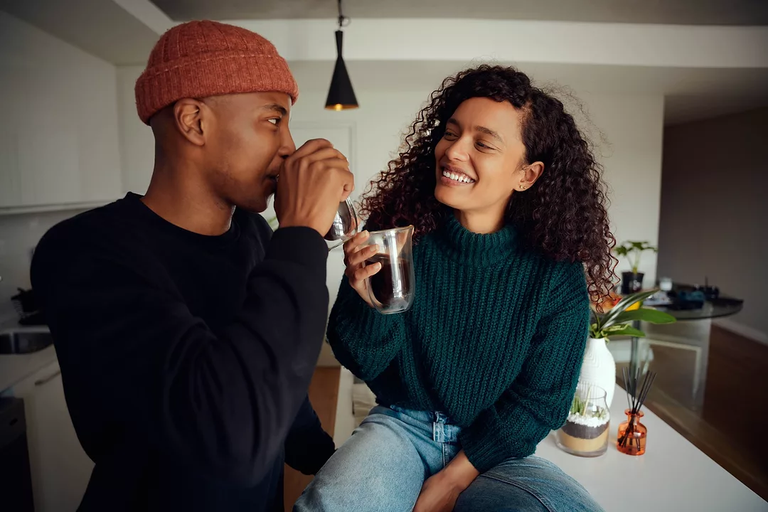 Couple-Coffee-Cozy-GettyImages-1324663930.jpeg