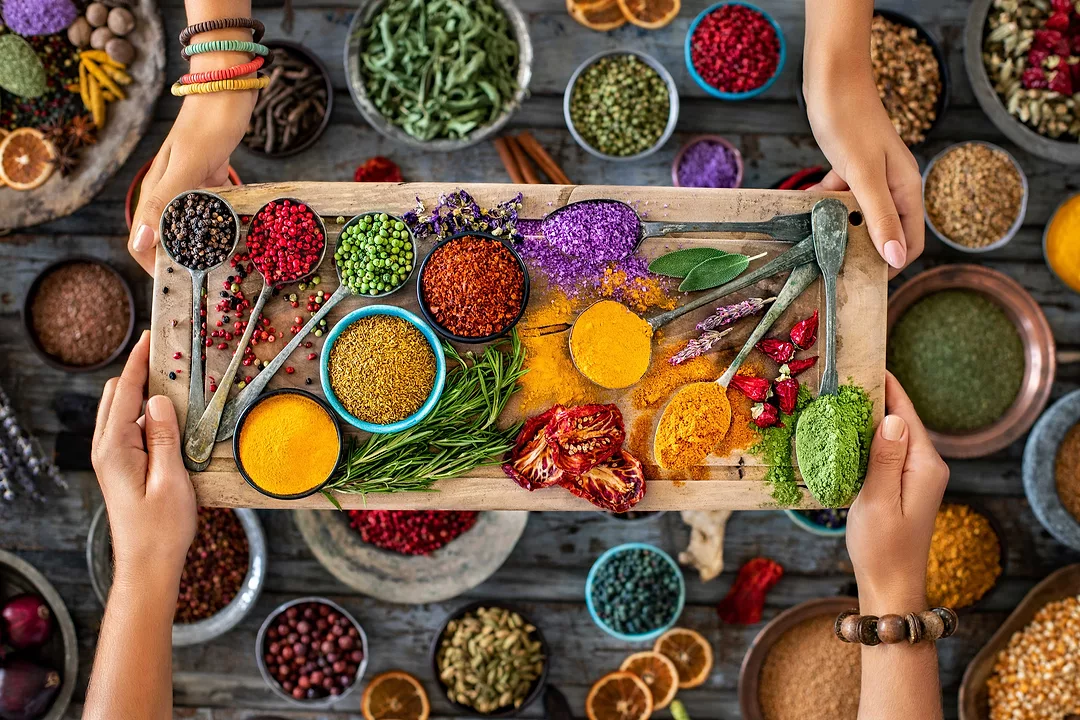 Food tray filled with spices and bold flavors.