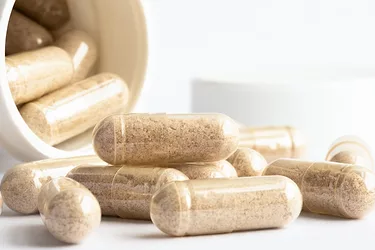 Saw Palmetto Capsules Spilled from a Bottle
