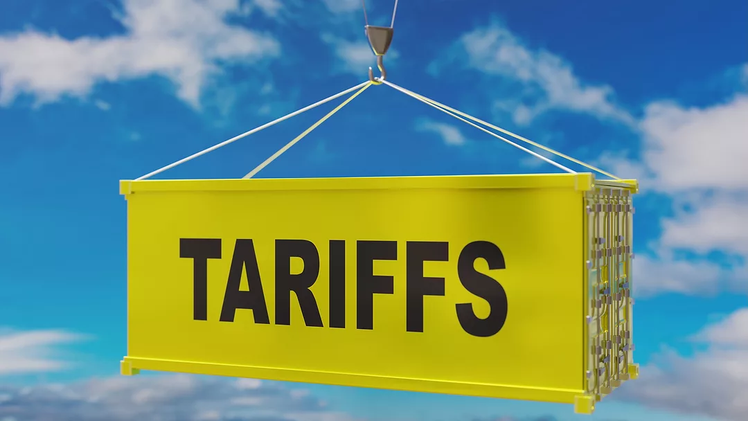 Tariffs text on a cargo conatiner. 3d render